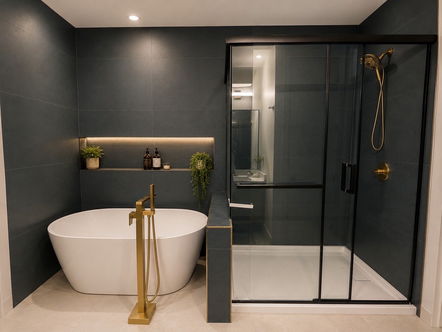 Spa-inspired ensuite with charcoal tile and brass fixtures
